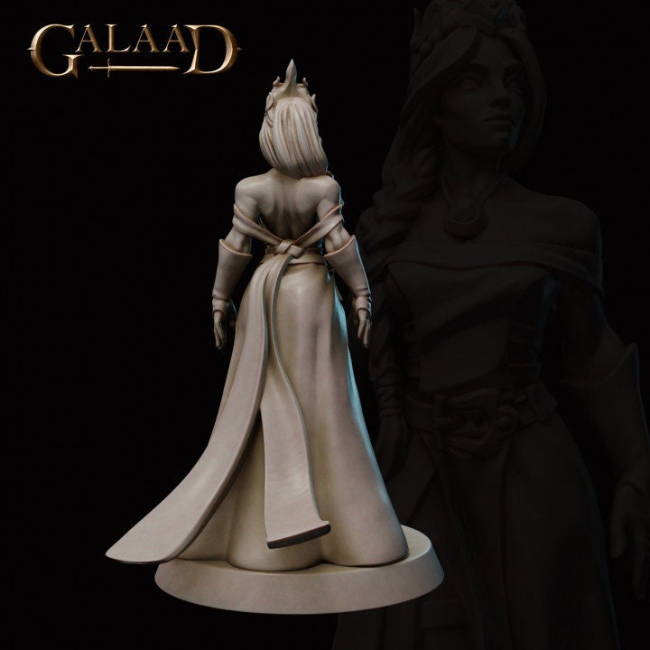 a statue of a woman standing next to a statue of a man