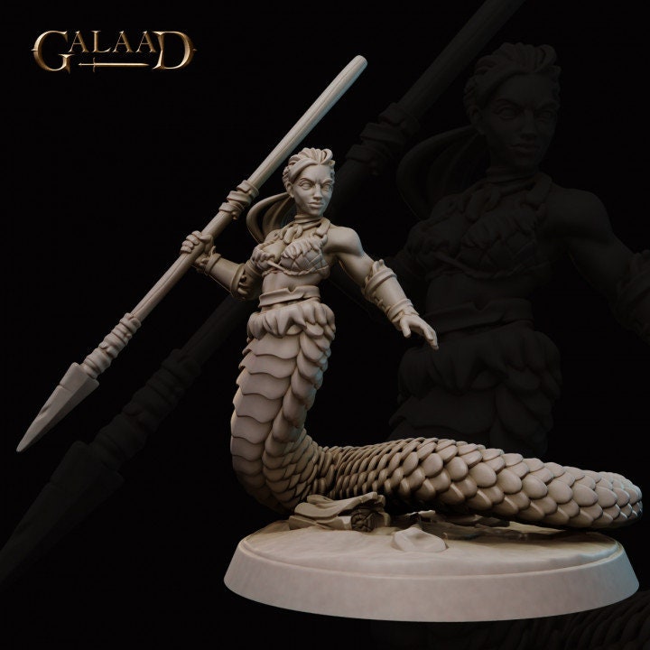 a statue of a woman holding a sword