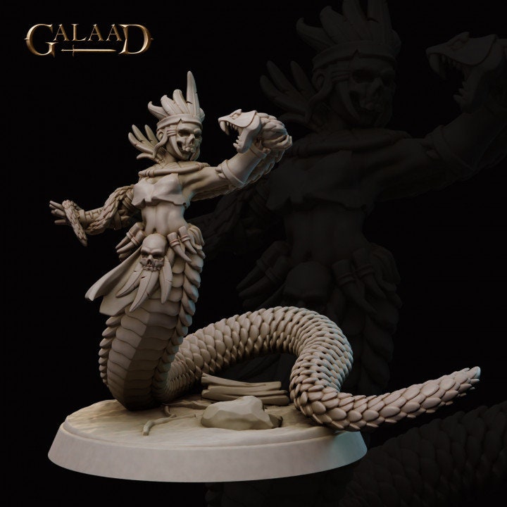a statue of a man holding a snake