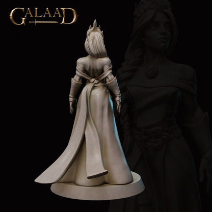 a statue of a woman standing next to a statue of a man