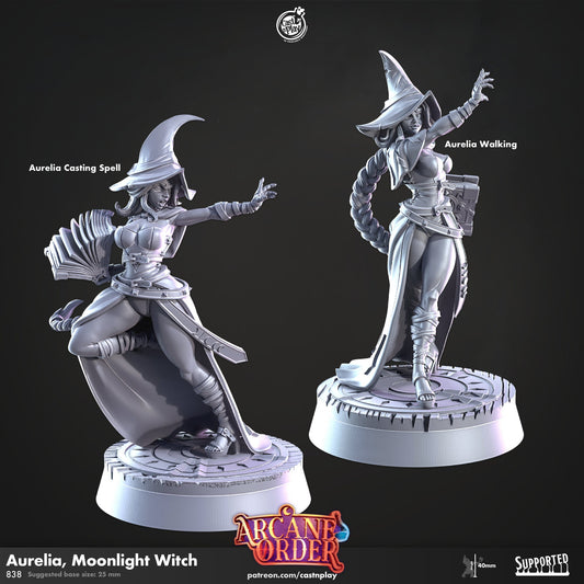 a statue of a woman in a witch costume