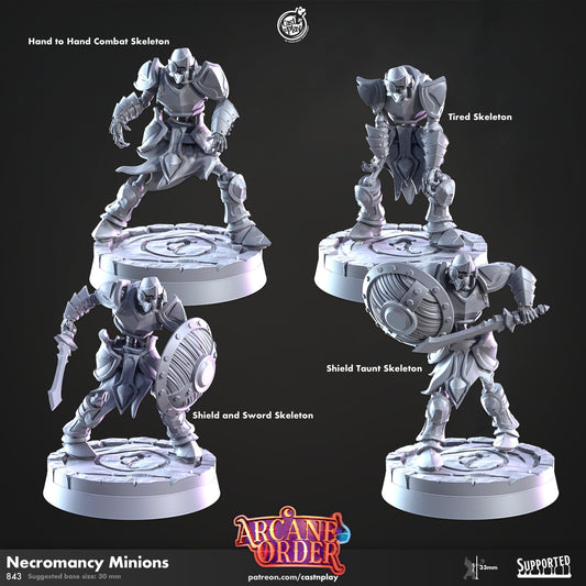 a set of three miniature figurines on a black background