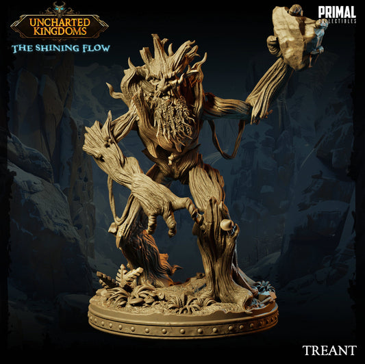 a statue of a demon holding a bird