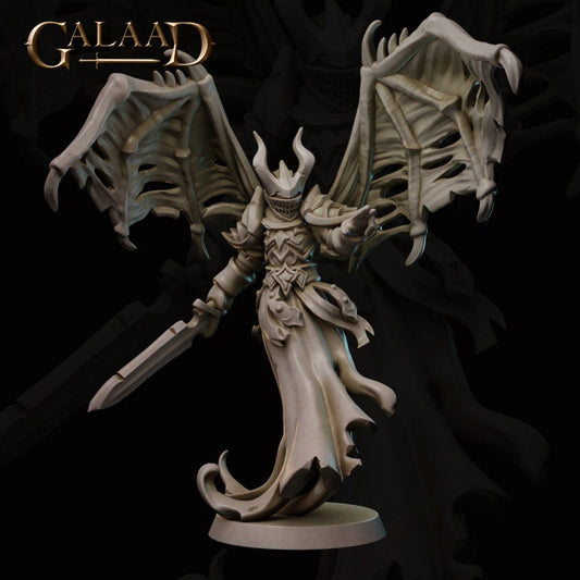 a statue of a demon with a sword