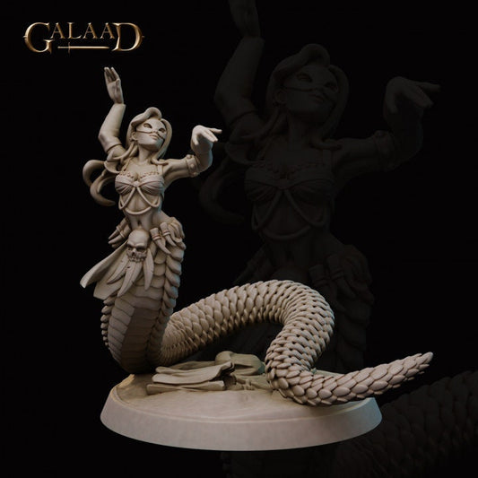a statue of a woman holding a snake